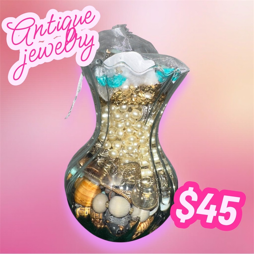 Elegant Glass Vase with Assorted Jewelry